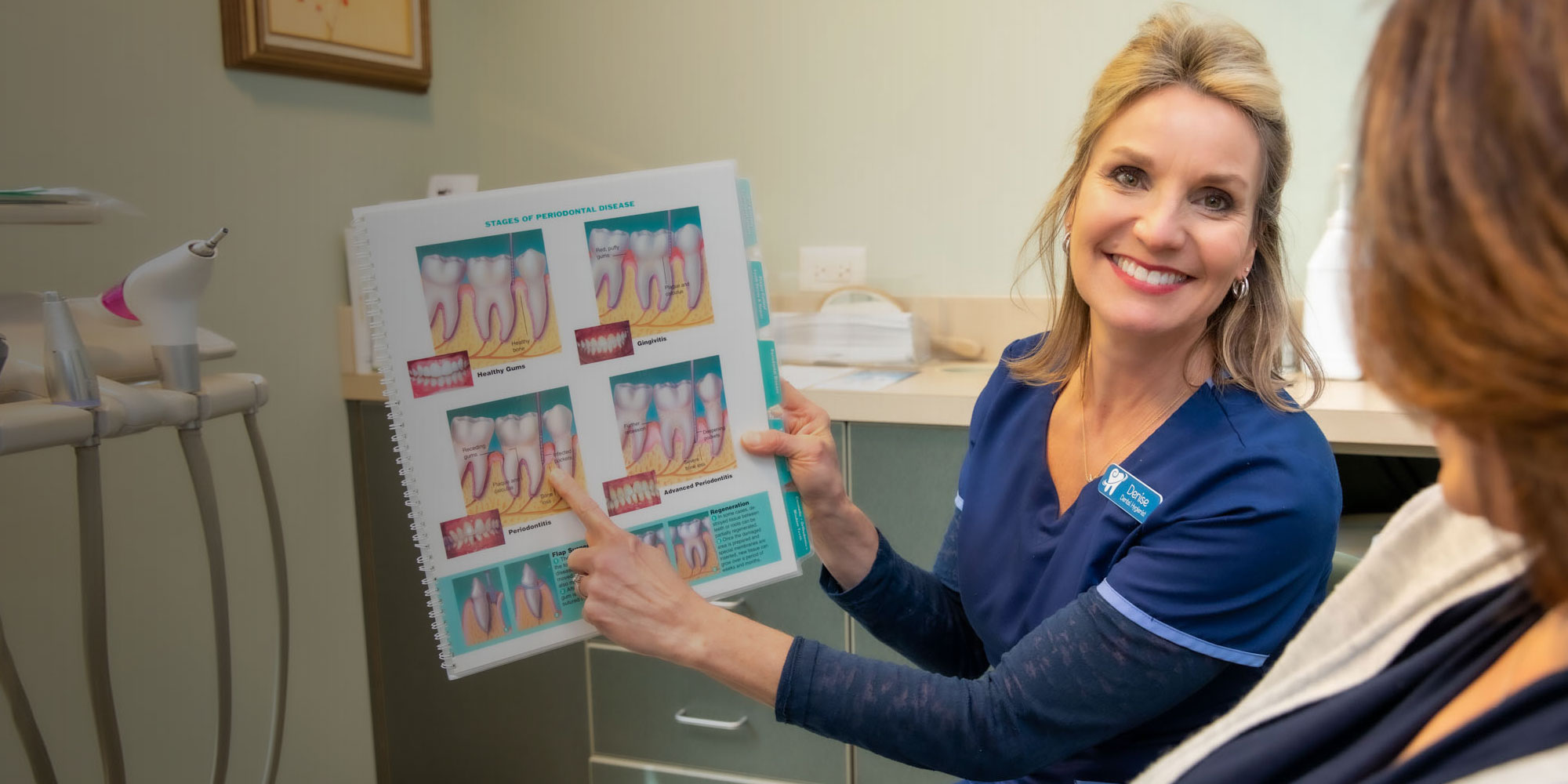 hygienist discussing overall dental health Waterford, CT